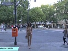 Naughty naked babe has fun on public streets Thumb