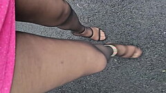 Renee` wearing black pantyhose, rainbow anklet, high fuck me heels, pink sparkley mini dress in publ Thumb