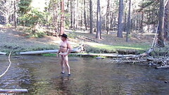 Naked bathing in the creek. Thumb