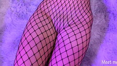 Asian in fishnet gives a footjob and gets cum all over her pussy Thumb