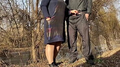 PAWG stepmom in pantyhose helps stepson pee on the lake Thumb