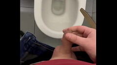 My dick cums in a public toilet close up Thumb